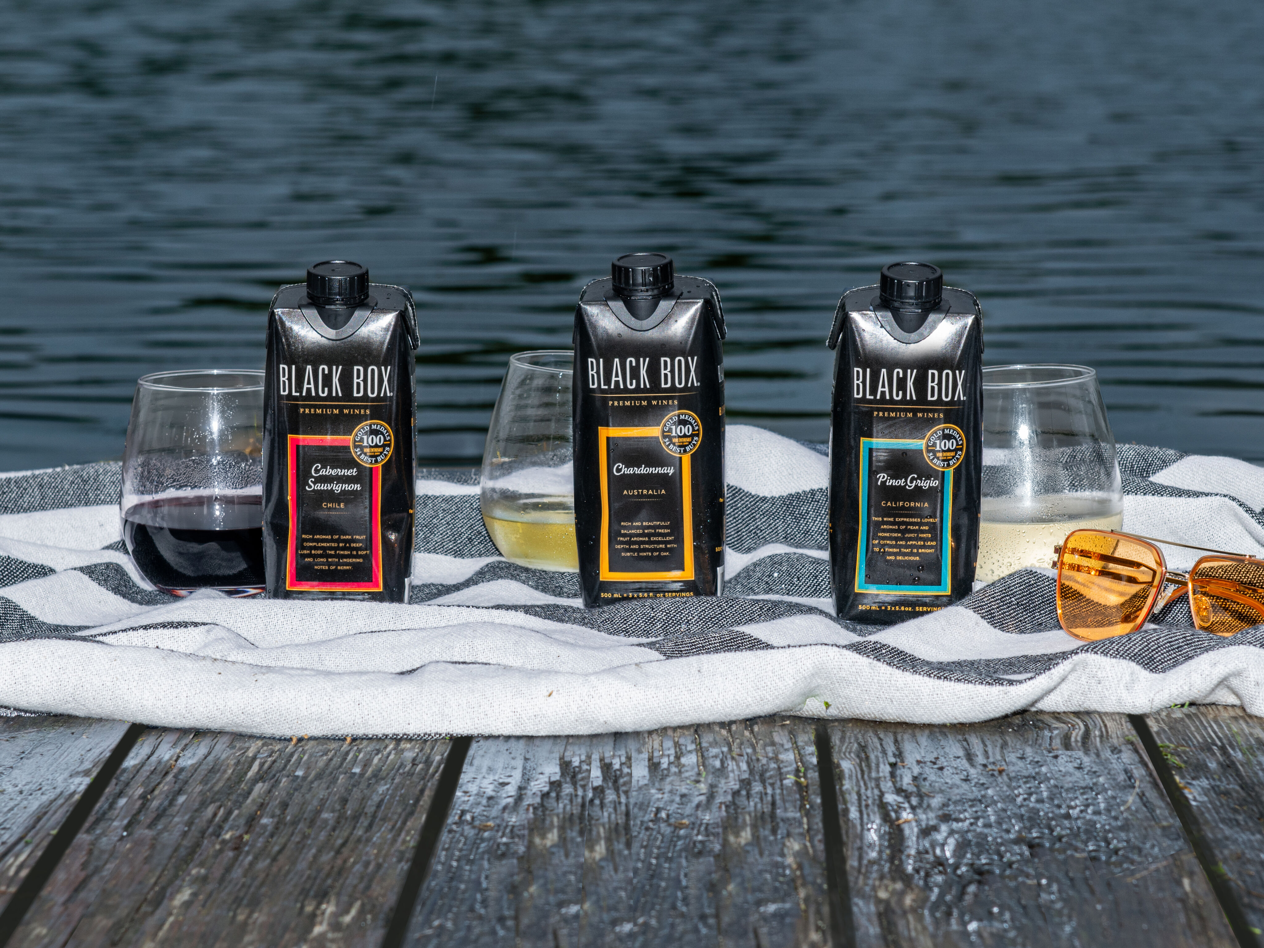 drinking Black Box Mini by the lake